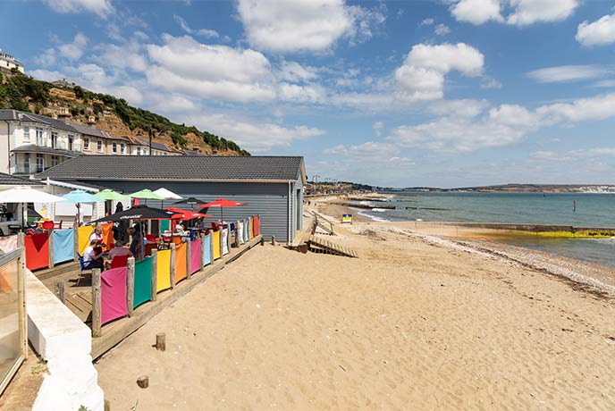 The colourful beach huts on Shanklin Beach on the Isle of Wight